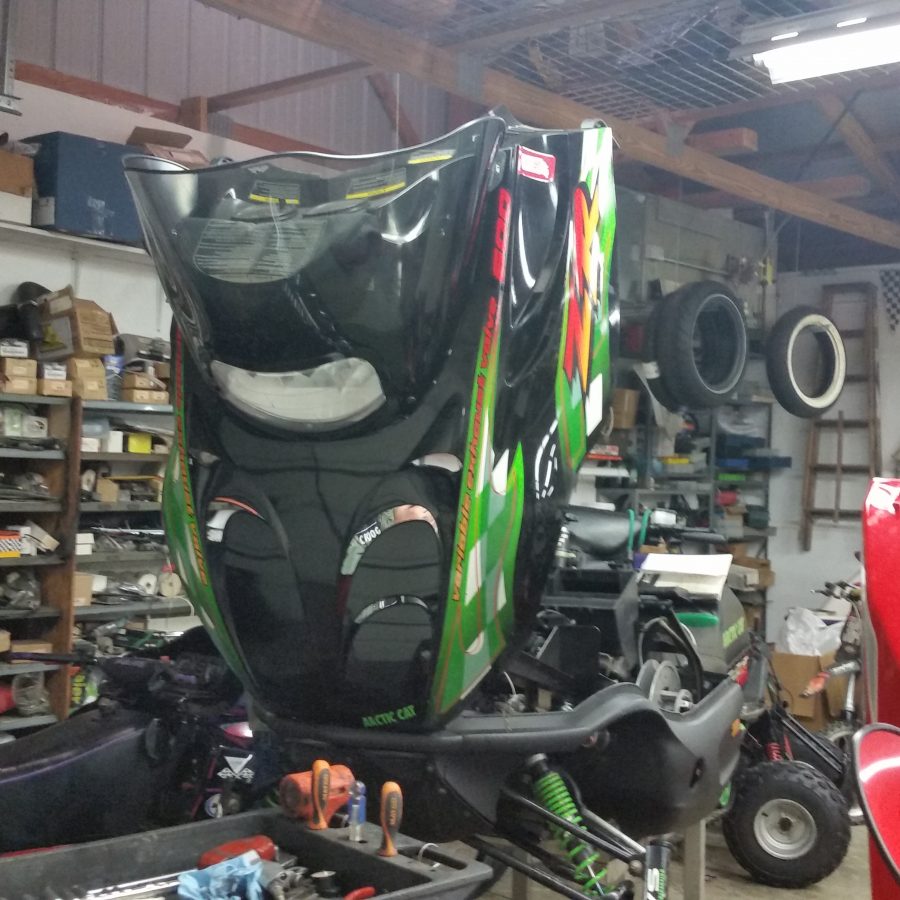 snowmobile repair shop image